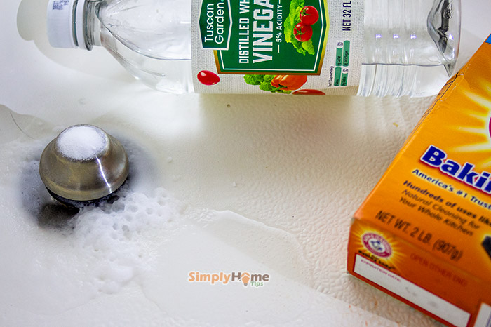 Unclog bathtub drain with baking soda and vinegar