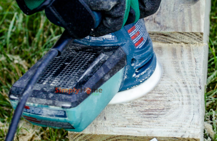 Sanding wood with a sander